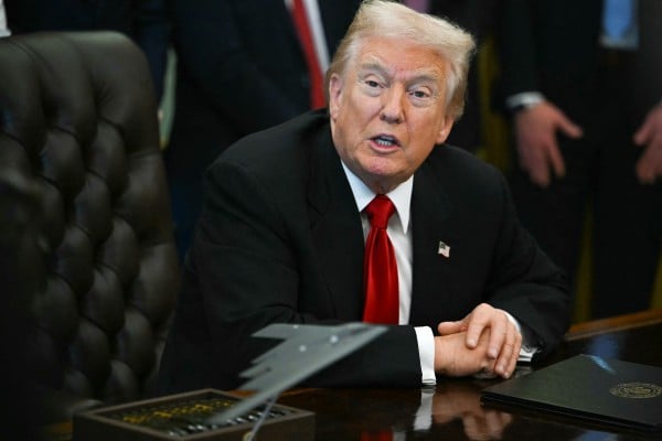 US President Donald Trump signed an extensive defence bill on Thursday that restricts US investment in Chinese technology companies and military firms. Photo: TNS US President Donald Trump signed an extensive defence bill on Thursday that restricts US investment in Chinese technology companies and military firms. Photo: TNS
