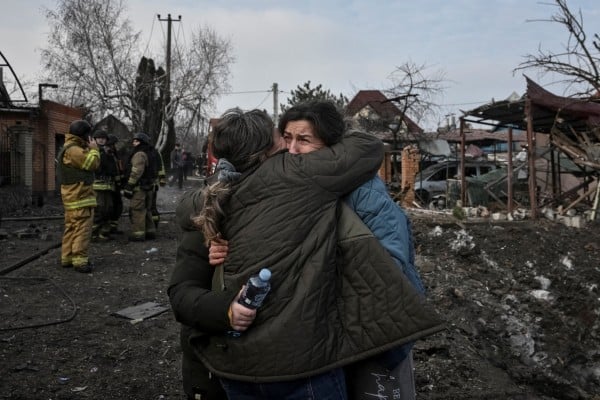 Residents react at the site of a Russian air strike in Zaporizhzhia, Ukraine, on Friday. Photo: Reuters Residents react at the site of a Russian air strike in Zaporizhzhia, Ukraine, on Friday. Photo: Reuters