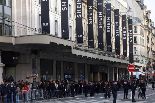 Shoppers queue for the opening of the first physical space for Chinese online fast-fashion retailer Shein in Paris. Photo: Reuters Shoppers queue for the opening of the first physical space for Chinese online fast-fashion retailer Shein in Paris. Photo: Reuters