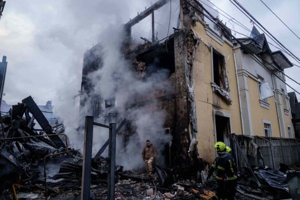 A man walks from a house destroyed after a Russian strike on Kyiv, Ukraine, on Saturday. Photo: AP A man walks from a house destroyed after a Russian strike on Kyiv, Ukraine, on Saturday. Photo: AP
