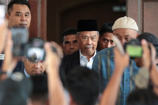 Former Malaysian prime minister Muhyiddin Yassin leaves the Gua Musang Sessions Court in Gua Musang on August 27, 2024. Photo: Reuters