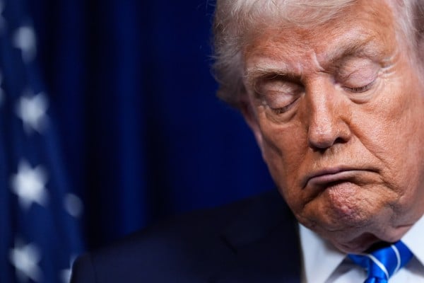 US President Donald Trump closes his eyes during a news conference at Mar-a-Lago in Palm Beach, Florida, on Sunday. Photo: AP US President Donald Trump closes his eyes during a news conference at Mar-a-Lago in Palm Beach, Florida, on Sunday. Photo: AP