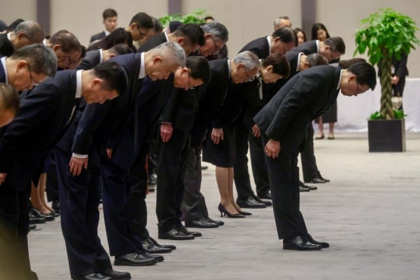 Chief Executive John Lee Ka-chiu and government officials at the ceremony of the Nanking massacre memorial held at the government’s headquarters on December 13. Photo: Jonathan Wong Chief Executive John Lee Ka-chiu and government officials at the ceremony of the Nanking massacre memorial held at the government’s headquarters on December 13. Photo: Jonathan Wong