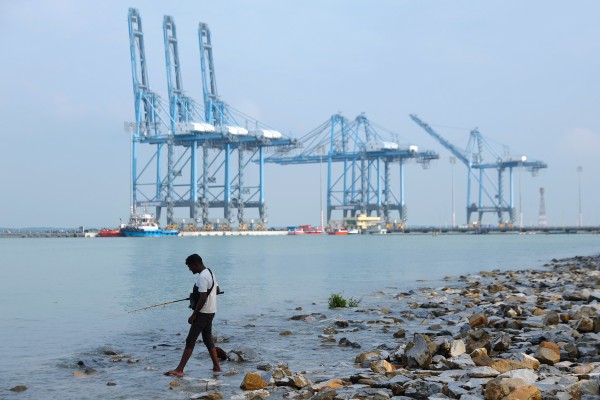 A man fishes in the maritime trading hub of Klang. Photo: EPA