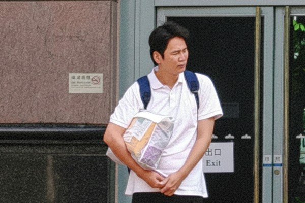 Mainland resident Zeng Yulin, who says he was a former squad leader of the People’s Liberation Army, leaves Fanling Court after securing bail in a hearing in October 2025. Photo: Brian Wong Mainland resident Zeng Yulin, who says he was a former squad leader of the People’s Liberation Army, leaves Fanling Court after securing bail in a hearing in October 2025. Photo: Brian Wong