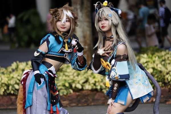 Anime cosplay enthusiasts pose for photos in Singapore in 2024. Photo: EPA-EFE