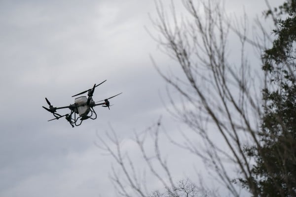A US farmer uses a DJI drone to put crop cover on his farm in Hickory, North Carolina. The Trump administration has dropped a plan to impose restrictions on Chinese-made drones. Photo: AP A US farmer uses a DJI drone to put crop cover on his farm in Hickory, North Carolina. The Trump administration has dropped a plan to impose restrictions on Chinese-made drones. Photo: AP