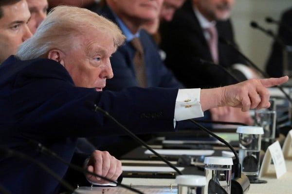 U.S. President Donald Trump points while sitting next to U.S. Secretary of State Marco Rubio as they attend a meeting with oil industry executives, at the White House in Washington, D.C., U.S., January 9, 2026. REUTERS/Evelyn Hockstein U.S. President Donald Trump points while sitting next to U.S. Secretary of State Marco Rubio as they attend a meeting with oil industry executives, at the White House in Washington, D.C., U.S., January 9, 2026. REUTERS/Evelyn Hockstein