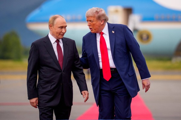 US President Donald Trump (right) greets Russian President Vladimir Putin at a military base in Alaska in August 2025. Photo: Getty Images via AFP