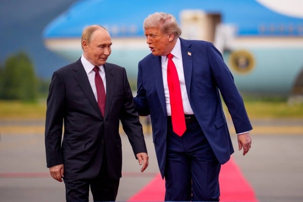 US President Donald Trump (right) greets Russian President Vladimir Putin at a military base in Alaska in August 2025. Photo: Getty Images via AFP US President Donald Trump (right) greets Russian President Vladimir Putin at a military base in Alaska in August 2025. Photo: Getty Images via AFP