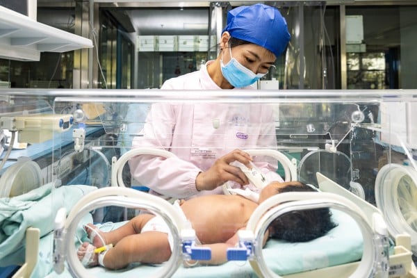 A nurse feeds a newborn at a hospital in Nanjing, China. The nation’s birthrate plunged by double digits last year. Photo: Getty Images A nurse feeds a newborn at a hospital in Nanjing, China. The nation’s birthrate plunged by double digits last year. Photo: Getty Images
