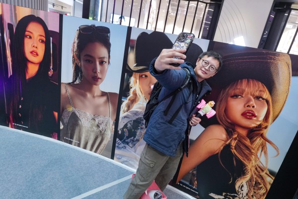 A Blackpink fan takes a selfie at a pop-up store in Kai Tak Mall 2. Photo:  Karma Lo