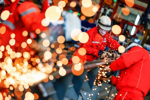 Workers grind a pipe on an offshore oil and gas platform in Tianjin’s Binhai New Area on Monday. Photo: Xinhua Workers grind a pipe on an offshore oil and gas platform in Tianjin’s Binhai New Area on Monday. Photo: Xinhua