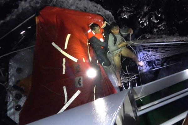 The Chinese coastguard rescues Filipino sailors near the disputed Scarborough Shoal in the South China Sea on Friday. Photo: China Coast Guard The Chinese coastguard rescues Filipino sailors near the disputed Scarborough Shoal in the South China Sea on Friday. Photo: China Coast Guard