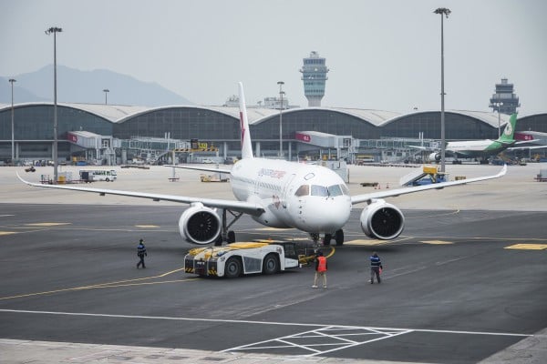 A China Eastern Airlines C919 begins taxiing to the runway at Hong Kong International Airport in January last year. Photo: Eugene Lee A China Eastern Airlines C919 begins taxiing to the runway at Hong Kong International Airport in January last year. Photo: Eugene Lee