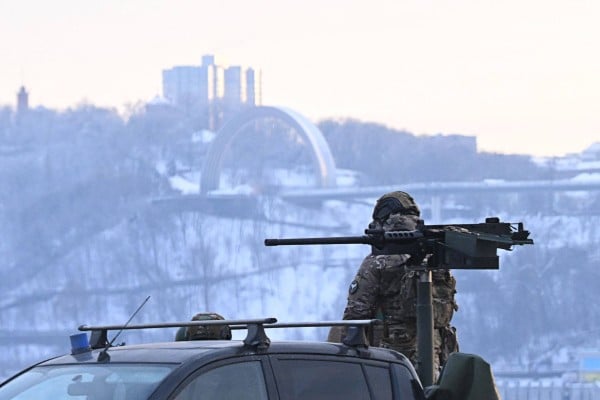 A Ukrainian serviceman stands next to a truck equipped with a machine gun during an air raid alert in Kyiv on Saturday. Photo: AFP A Ukrainian serviceman stands next to a truck equipped with a machine gun during an air raid alert in Kyiv on Saturday. Photo: AFP