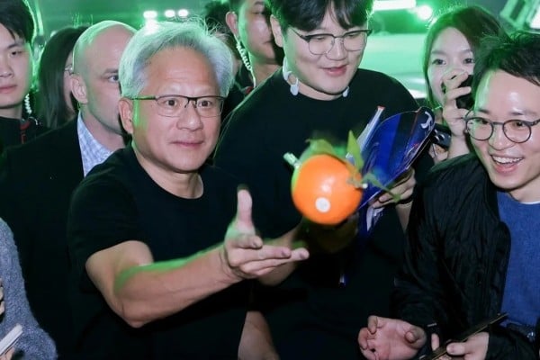 Jensen Huang hands out tangerines at Nvidia’s annual Lunar New Year celebration in Shanghai on January 24, 2026. Photo: Handout Jensen Huang hands out tangerines at Nvidia’s annual Lunar New Year celebration in Shanghai on January 24, 2026. Photo: Handout