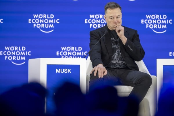 Tesla CEO Elon Musk speaks during a panel discussion at the World Economic Forum (WEF), in Davos, Switzerland. Tesla has reported that its annual revenues declined for the first time in the company’s history in 2025. Photo: EPA Tesla CEO Elon Musk speaks during a panel discussion at the World Economic Forum (WEF), in Davos, Switzerland. Tesla has reported that its annual revenues declined for the first time in the company’s history in 2025. Photo: EPA