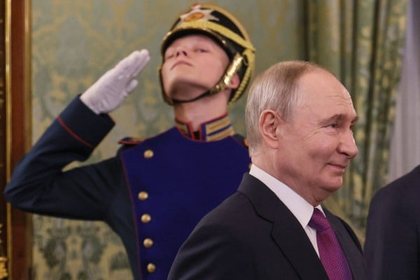 Russian President Vladimir Putin enters a hall for the meeting with Syria’s president at the Kremlin in Moscow. Photo: Kremlin pool via AFP Russian President Vladimir Putin enters a hall for the meeting with Syria’s president at the Kremlin in Moscow. Photo: Kremlin pool via AFP