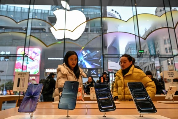 People look at iPhones in an Apple store in the Huangpu district of Shanghai on January 20, 2026. Photo: AFP People look at iPhones in an Apple store in the Huangpu district of Shanghai on January 20, 2026. Photo: AFP
