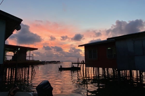 A fisherman goes out in his boat in Semporna, Sabah, Malaysia. Photo: Ushar Daniele A fisherman goes out in his boat in Semporna, Sabah, Malaysia. Photo: Ushar Daniele