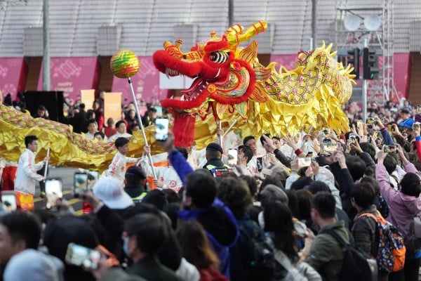A lion dance group rehearses ahead of the 2025 Cathay International Chinese New Year Night Parade on Canton Road in Tsim Sha Tsui. Photo: Eugene Lee A lion dance group rehearses ahead of the 2025 Cathay International Chinese New Year Night Parade on Canton Road in Tsim Sha Tsui. Photo: Eugene Lee