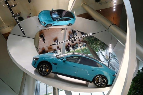 A Xiaomi SU7 Max is displayed at the entrance of the company’s EV factory in Beijing. Photo: AFP A Xiaomi SU7 Max is displayed at the entrance of the company’s EV factory in Beijing. Photo: AFP