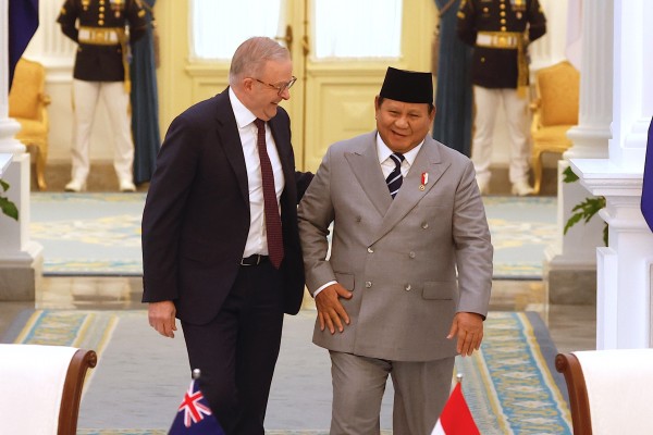 Australia’s Prime Minister Anthony Albanese (left) chats with Indonesia’s President Prabowo Subianto as they walk to their meeting at Merdeka Palace in Jakarta on Friday. Photo: EPA