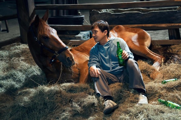 Jackie Chan in a still from Ride On, one of five films we examine that feature horses in important roles. Jackie Chan in a still from Ride On, one of five films we examine that feature horses in important roles.