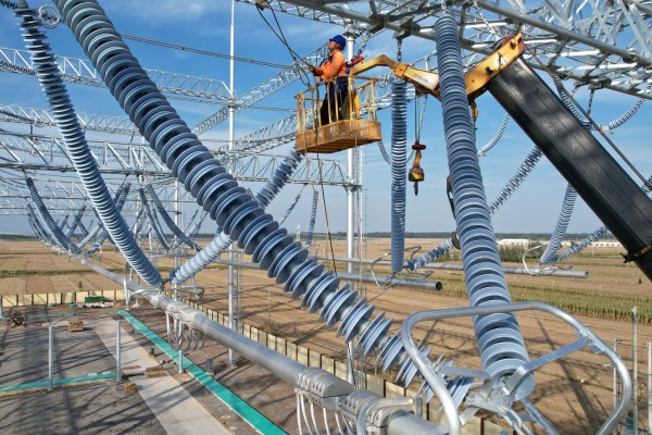 Workers are seen at a power substation in China’s Hebei province. Photo: Xinhua