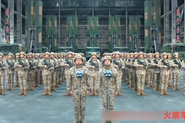 Members of the People’s Liberation Army stand at attention as Chinese President Xi Jinping inspects their combat readiness via video link in Beijing on Tuesday. Photo: Xinhua Members of the People’s Liberation Army stand at attention as Chinese President Xi Jinping inspects their combat readiness via video link in Beijing on Tuesday. Photo: Xinhua