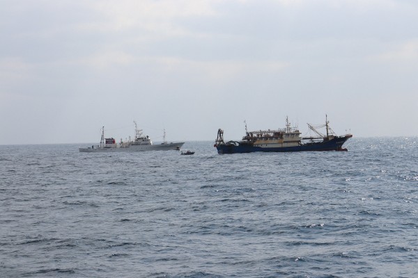 A Japanese fisheries agency patrol vessel follows the Chinese fishing vessel Qiong Dong Yu in waters off Japan’s southwest Nagasaki prefecture on Thursday. Photo: Handout