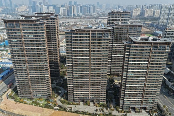 New and existing home prices across 70 major mainland cities fell at a slower pace month on month in January, according to data released by the National Bureau of Statistics. Photo: AFP