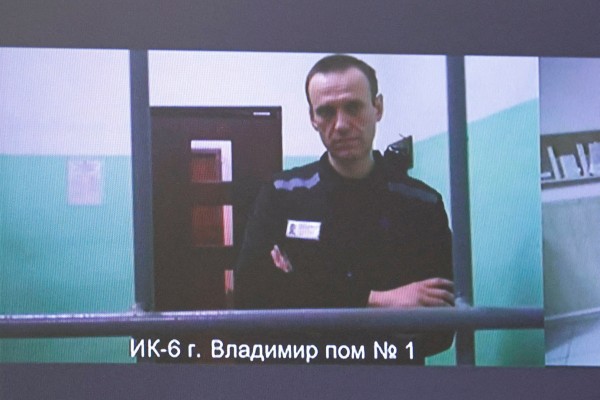Alexei Navalny appearing on a screen via video link from the IK-6 penal colony in 2023. Photo: Reuters
