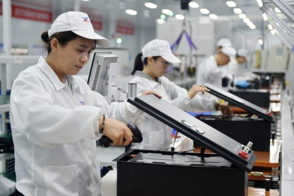 Workers produce lithium batteries in Qinyang, central China’s Henan province. Photo: Xinhua
Workers produce lithium batteries in Qinyang, central China’s Henan province. Photo: Xinhua