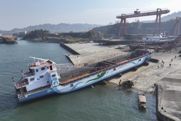 China is building electric cargo ships to decarbonise the nation’s waterways. This December 2024 image shows the nation’s first “clean drift transfer” ship, which is a zero-emission vessel designed to collect floating debris and waste from rivers, lakes or coastal areas. Photo: Getty Images China is building electric cargo ships to decarbonise the nation’s waterways. This December 2024 image shows the nation’s first “clean drift transfer” ship, which is a zero-emission vessel designed to collect floating debris and waste from rivers, lakes or coastal areas. Photo: Getty Images