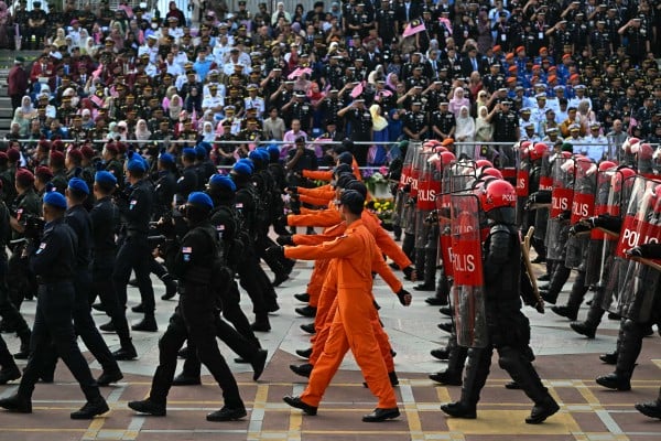 Malaysian police parade at National Day celebrations in Putrajaya on August 31, 2024. Photo: AFP Malaysian police parade at National Day celebrations in Putrajaya on August 31, 2024. Photo: AFP