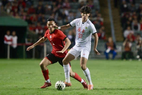 Jacky Leung (left) tracks Wang Xiyang during the first leg of this year’s Guangdong-Hong Kong Cup. Photo: Jonathan Wong Jacky Leung (left) tracks Wang Xiyang during the first leg of this year’s Guangdong-Hong Kong Cup. Photo: Jonathan Wong