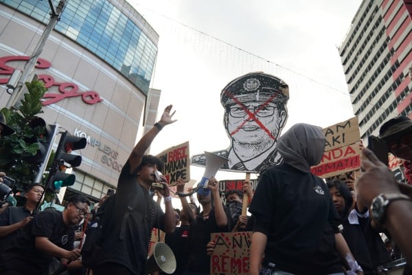 Protesters carry a sign with Malaysia’s anti-corruption chief Azam Baki’s face at a rally on Sunday. Photo: SCMP files Protesters carry a sign with Malaysia’s anti-corruption chief Azam Baki’s face at a rally on Sunday. Photo: SCMP files