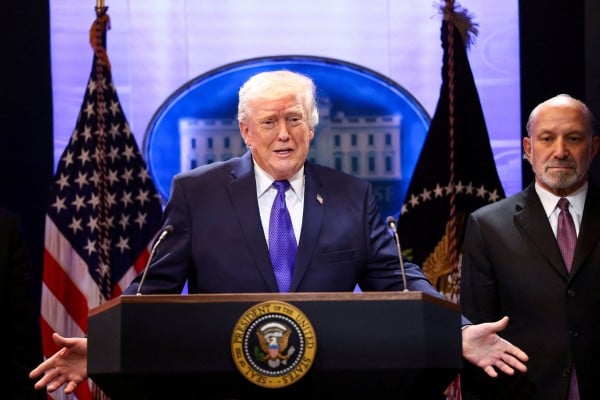 US President Donald Trump, flanked by Secretary of Commerce Howard Lutnick speaks during a press briefing at the White House, following the Supreme Court’s ruling that Trump had exceeded his authority when he imposed sweeping global tariffs last year. Photo: Reuters US President Donald Trump, flanked by Secretary of Commerce Howard Lutnick speaks during a press briefing at the White House, following the Supreme Court’s ruling that Trump had exceeded his authority when he imposed sweeping global tariffs last year. Photo: Reuters