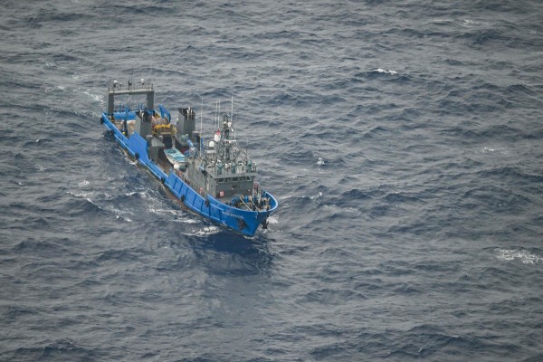 A vessel identified by the Philippine coastguard as Chinese maritime militia is seen near the contested Scarborough Shoal in the South China Sea in February 2025. Photo: AFP