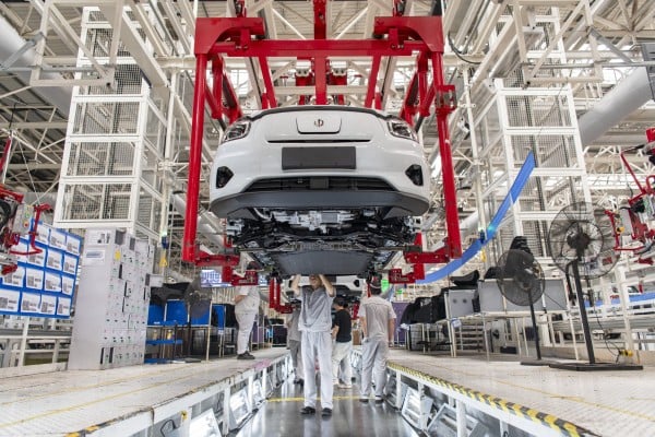 Employees work on the assembly line of new energy vehicles at Zero Run’s plant in Jinhua, Zhejiang province. Photo: VCG via Getty Images