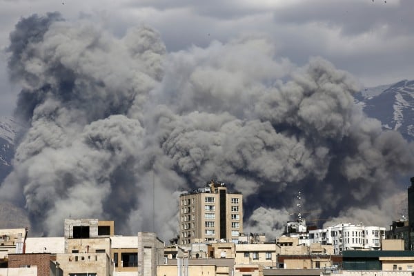 Smoke rises over Tehran after US and Israeli strikes on March 1. The growing conflict in the Middle East is disrupting shipping flows, affecting China’s imports of key materials. Photo: Getty Images