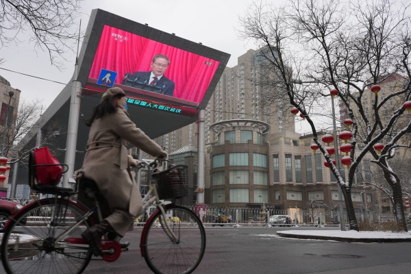 Chinese Premier Li Qiang’s speech at the National People’s Congress opening session is broadcast on a giant TV screen, in Beijing on Thursday. Photo: Robert Ng Chinese Premier Li Qiang’s speech at the National People’s Congress opening session is broadcast on a giant TV screen, in Beijing on Thursday. Photo: Robert Ng