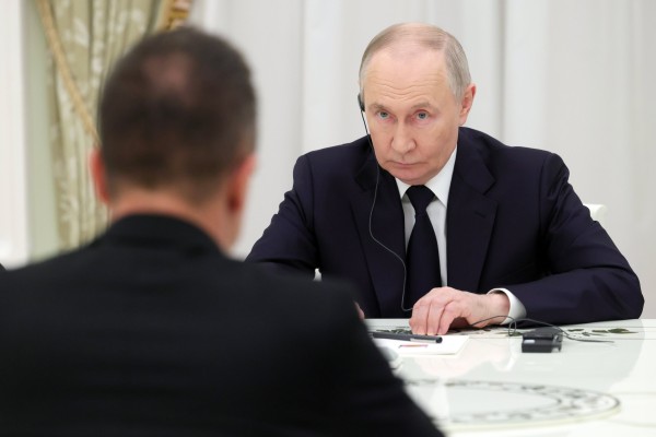 Russian President Vladimir Putin attends a meeting at the Kremlin in Moscow on Wednesday. Photo: Sputnik via EPA