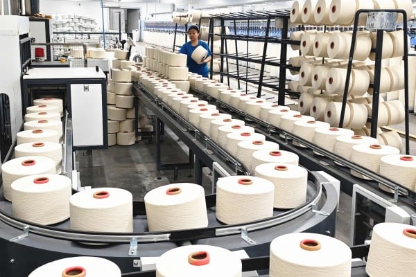 A senior official in Xinjiang Uygur autonomous region says he will fight external pressure on the textile industry, including from US sanctions, and boost legal support for affected companies. Photo: AFP