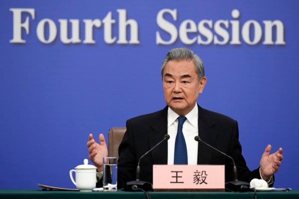 China top diplomat Wang Yi speaks to the press about Beijing’s foreign policy objectives during the “two sessions” in Beijing on March 8. Photo: AFP China top diplomat Wang Yi speaks to the press about Beijing’s foreign policy objectives during the “two sessions” in Beijing on March 8. Photo: AFP