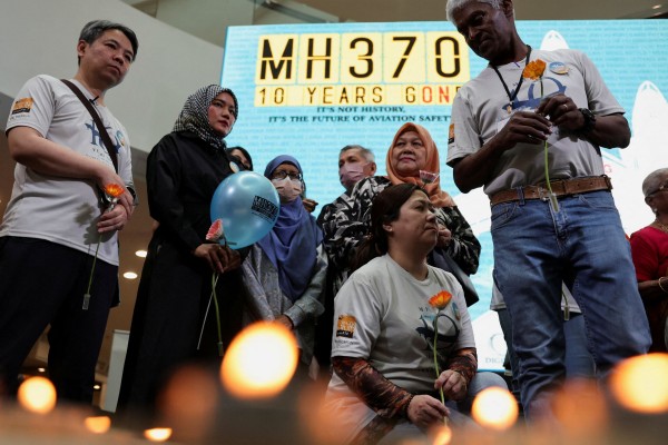 Families of passengers from both China and Malaysia, who were aboard the missing Malaysia Airlines flight MH370, during a remembrance event commemorating the 10th anniversary of the disappearance, in Subang Jaya, Malaysia, March 3, 2024. Photo: Reuters