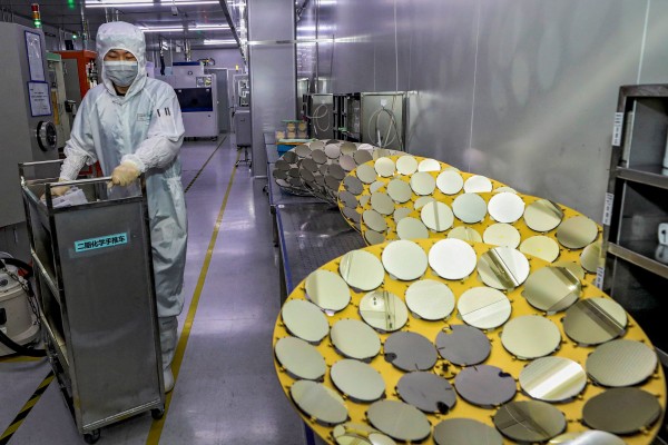 The five-year plan blueprint calls for breakthroughs in critical technologies across the entire semiconductor value chain. Photo: AFP