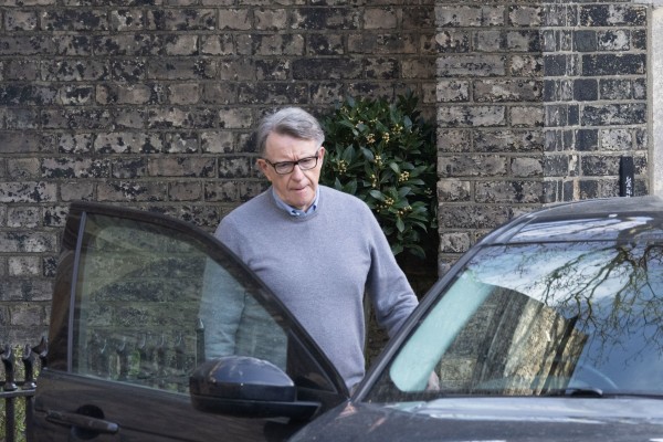Peter Mandelson leaves his home in north London on Wednesday. Photo: via AP